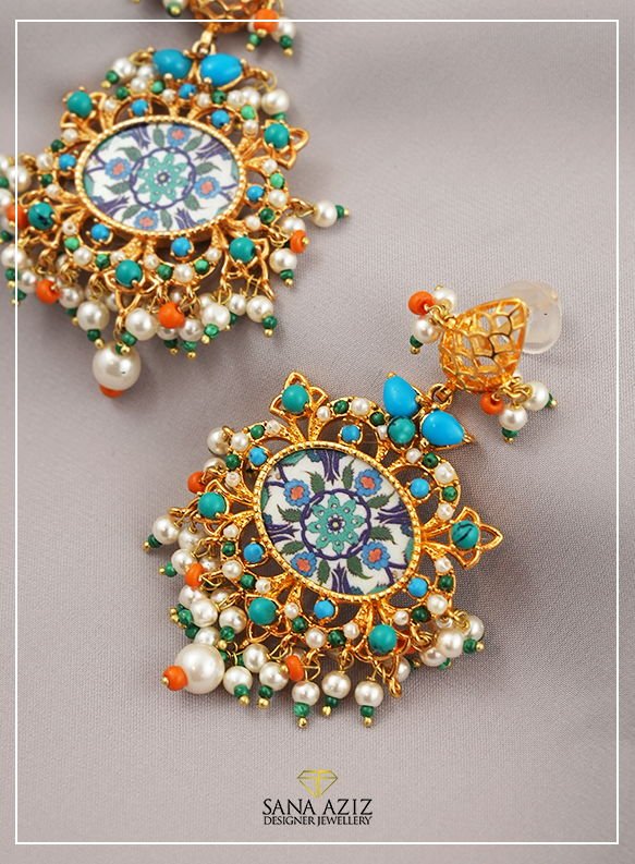 Detail view of the ratan Arabesque Earrings, from the Arabesque collection.