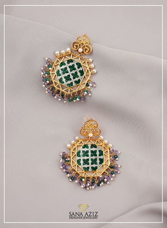 Detail view of the green Clove Arabesque Earrings, from the Arabesque collection.