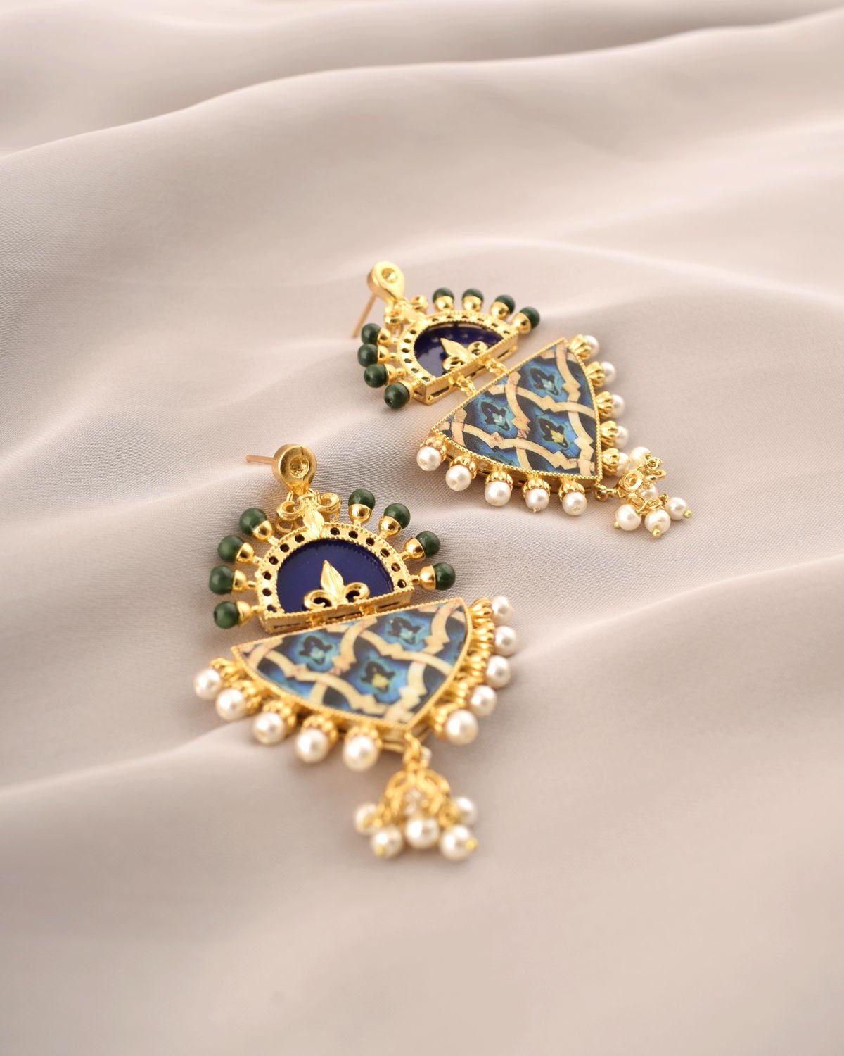 Detail view of the blue-Green Arabesque Earrings, from the Arabesque collection.
