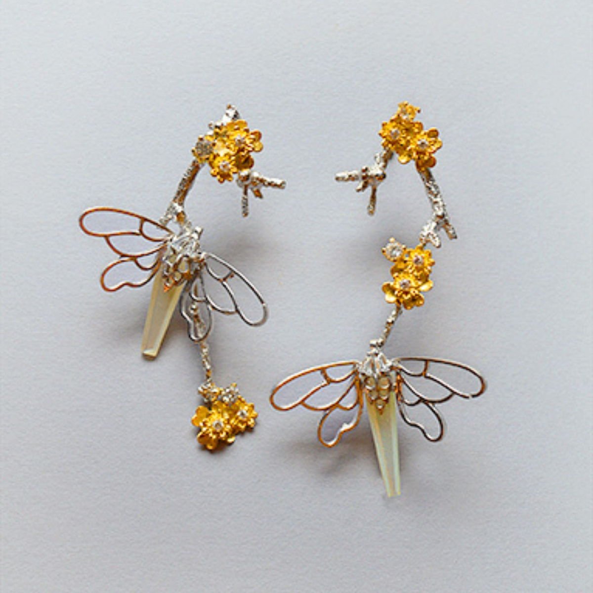 Butterfly Twig Earrings with Mother of Pearl and Zircons, from the Lei collection.
