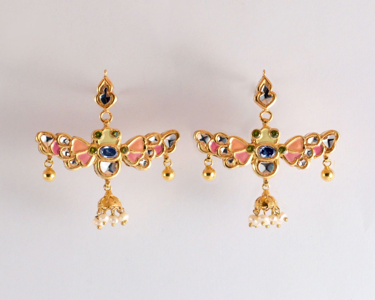 Butterfly earrings with kundan and enameled fronts, from the Safari collection.