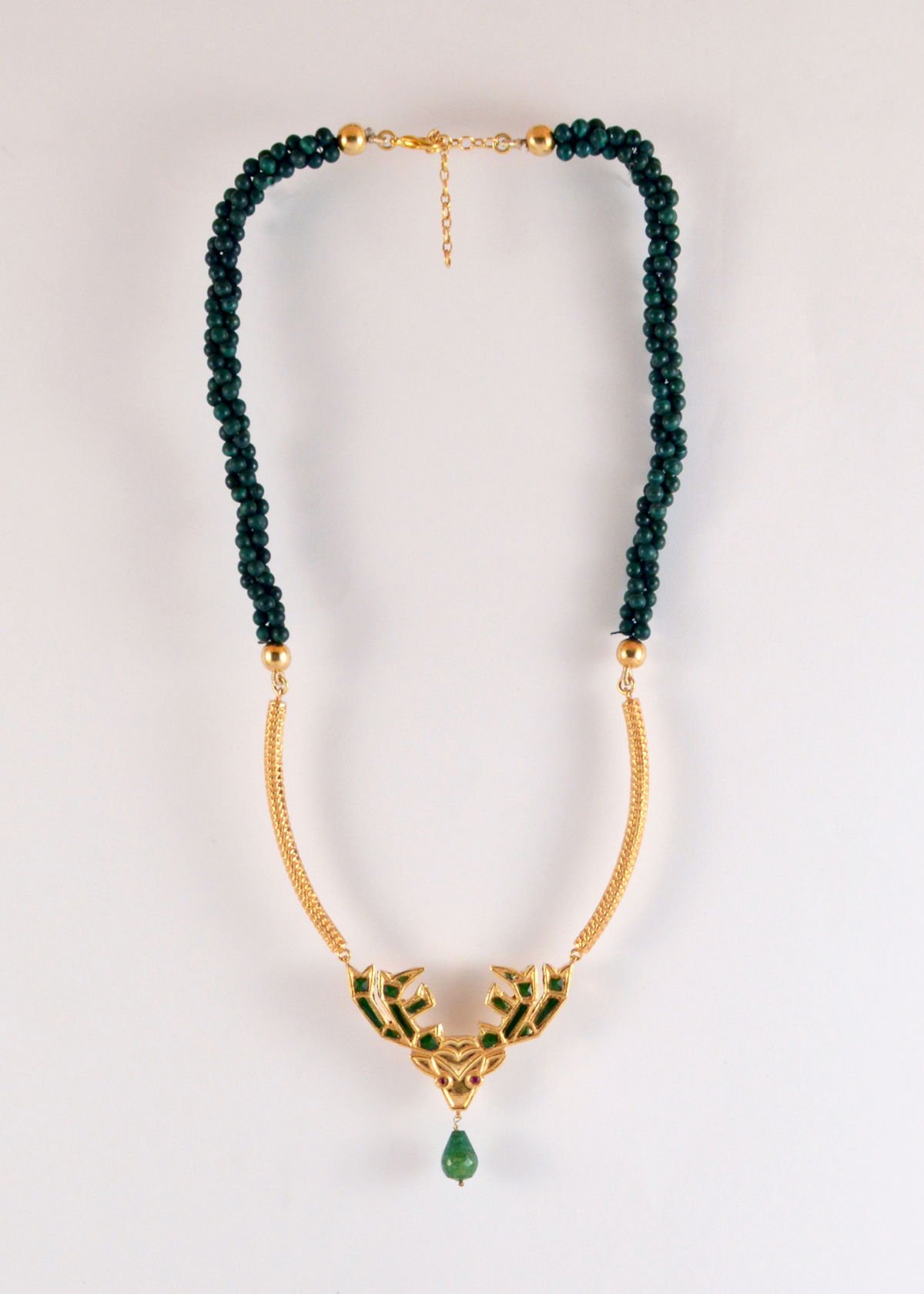 Stag necklace with twisted malachite and jade drop, from the Safari collection.