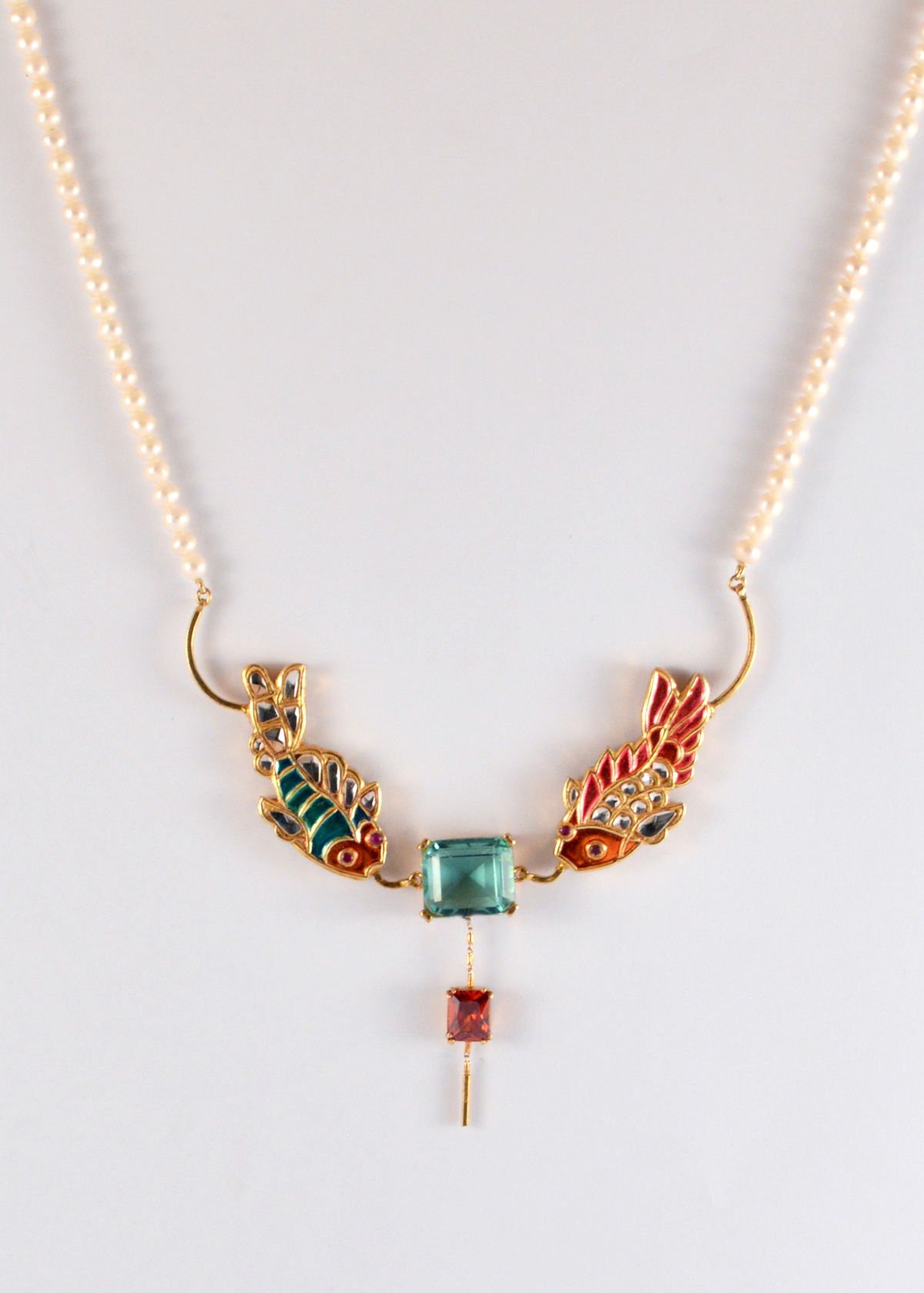 Fish pair necklace with topaz and zircon, from the Safari collection.